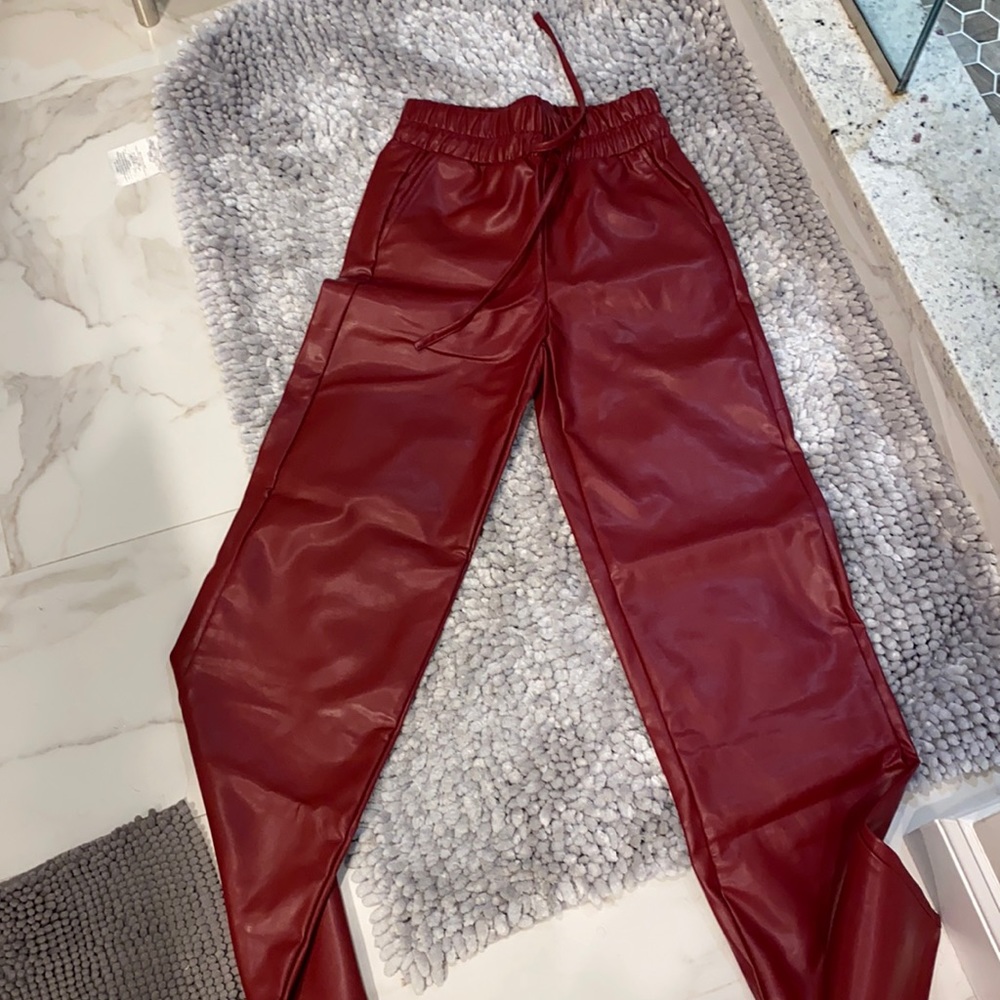 Red leather high waisted pants